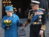 <p>Prince Philip, Duke of Edinburgh (R) and Queen Elizabeth II depart a Service of Commemoration for troops who were stationed in Afghanistan, London, England, March 13, 2015.</p>