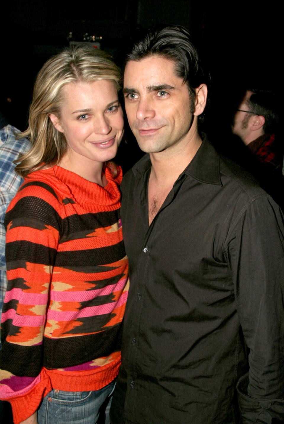 Rebecca Romijn and John Stamos