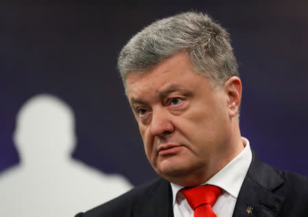 Ukraine's President and presidential candidate Petro Poroshenko speaks after a drugs and alcohol test, which is a precondition to participate in a policy debate ahead of the second round of a presidential election, conducted by the Voluntary Anti-Doping Association (VADA) at NSC Olimpiyskiy Stadium in Kiev, Ukraine April 10, 2019. REUTERS/Valentyn Ogirenko