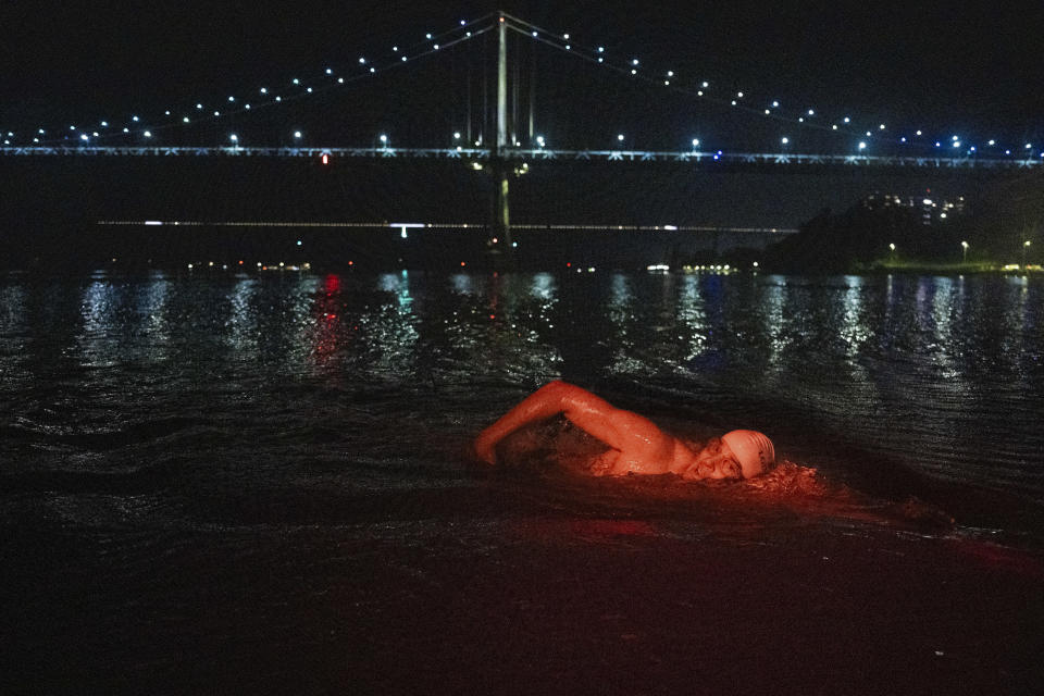 Lewis Pugh swims at night