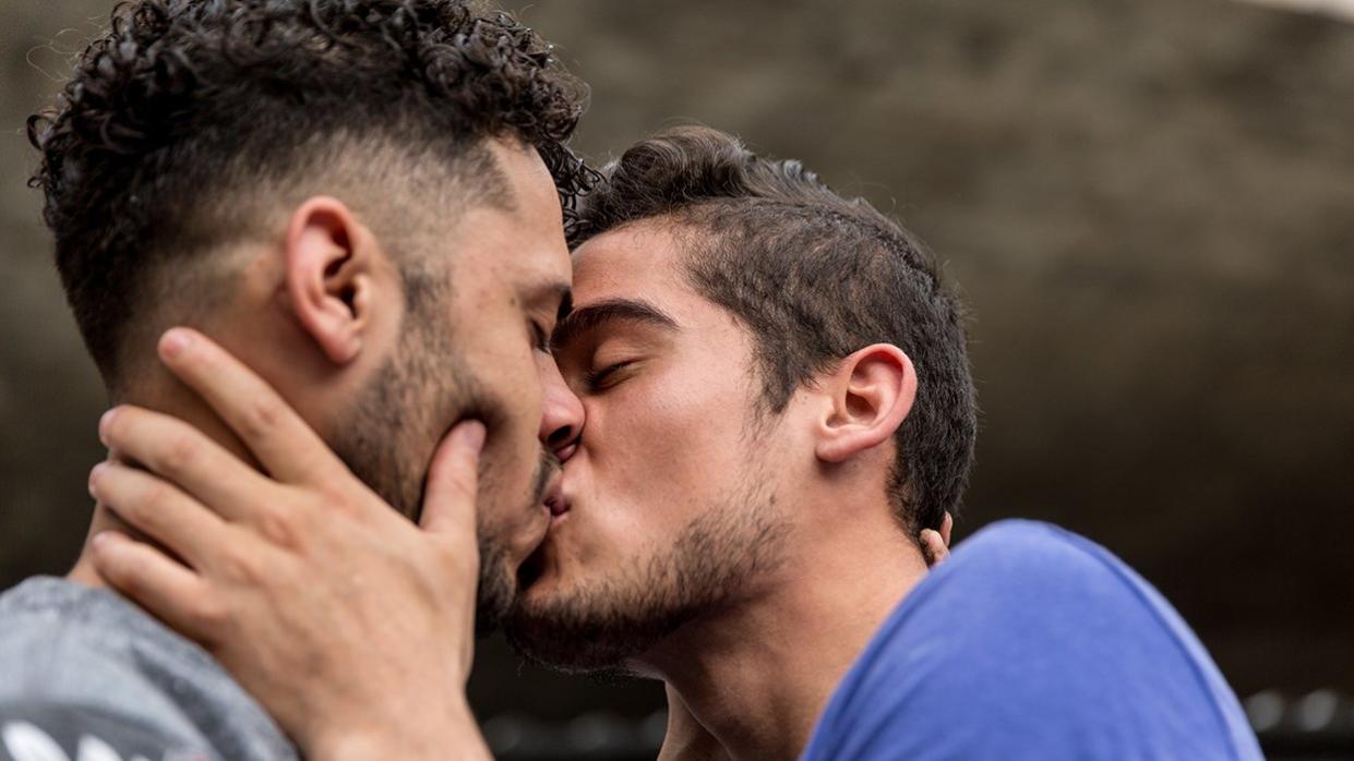 Men Kissing 