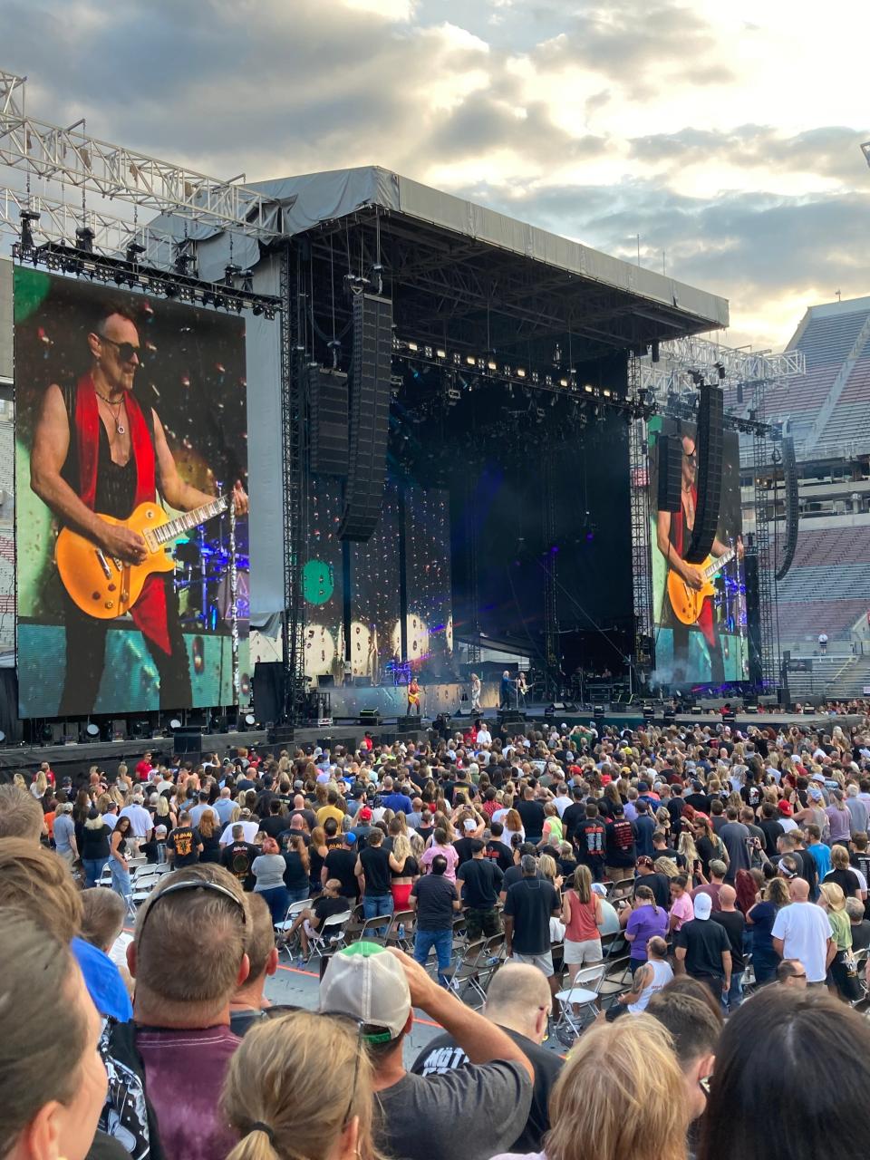 Def Leppard guitarist Vivian Campbell is featured on the big screens at Tuesday's Motley Crue/Def Leppard/Alice Cooper show at Ohio Stadium