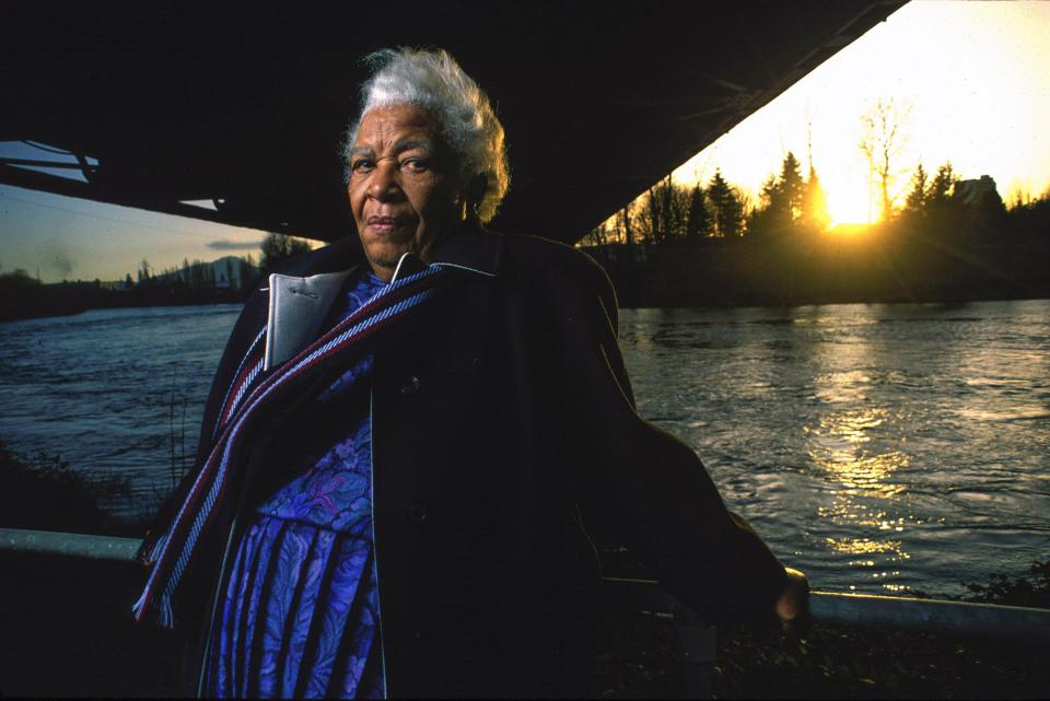 Mattie Reynolds stands under the Ferry Street Bridge in 1993 on the north bank of the Willamette River near where her family lived until the 1950s. The family was forced to move to make way for the bridge's construction. Reynolds died in 2010.