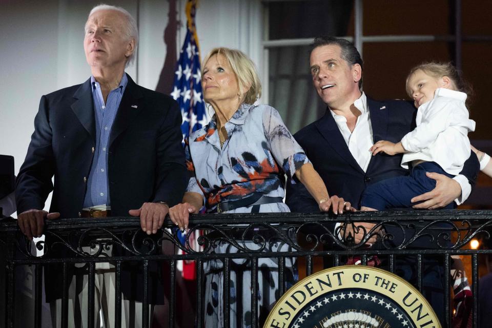 President Joe Biden, First Lady Jill Biden and Hunter Biden with his son Beau watch the Independence Day fireworks display from the Truman Balcony of the White House in Washington, DC, on July 4, 2023.