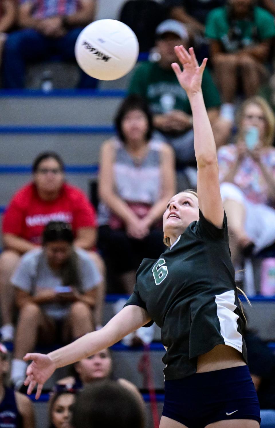 El Diamante's Haley Wells hits against Tulare Western in a non-league high school volleyball match on Tuesday, September 13, 2022. 