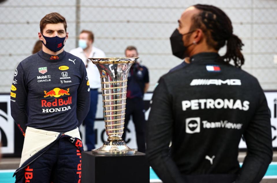 Max Verstappen stares at Lewis Hamilton prior to the winner-takes-all Abu Dhabi Grand Prix in 2021 (Getty)