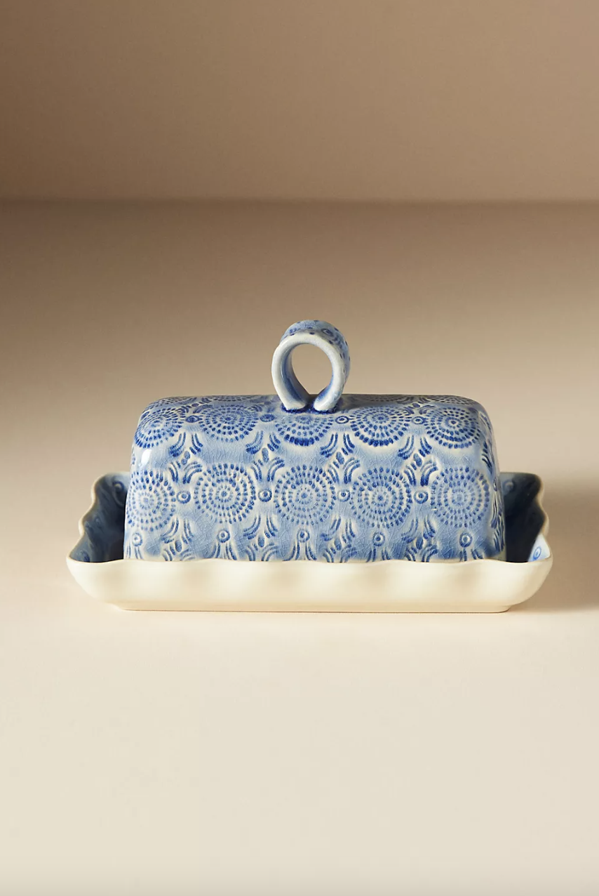 <p><a href="https://go.redirectingat.com?id=74968X1596630&url=https%3A%2F%2Fwww.anthropologie.com%2Fshop%2Fold-havana-butter-dish&sref=https%3A%2F%2Fwww.housebeautiful.com%2Fshopping%2Fg1974%2Fhostess-gifts%2F" rel="nofollow noopener" target="_blank" data-ylk="slk:Shop Now;elm:context_link;itc:0;sec:content-canvas" class="link ">Shop Now</a></p><p>Old Havana Butter Dish</p><p>anthropologie.com</p><p>$34.00</p>