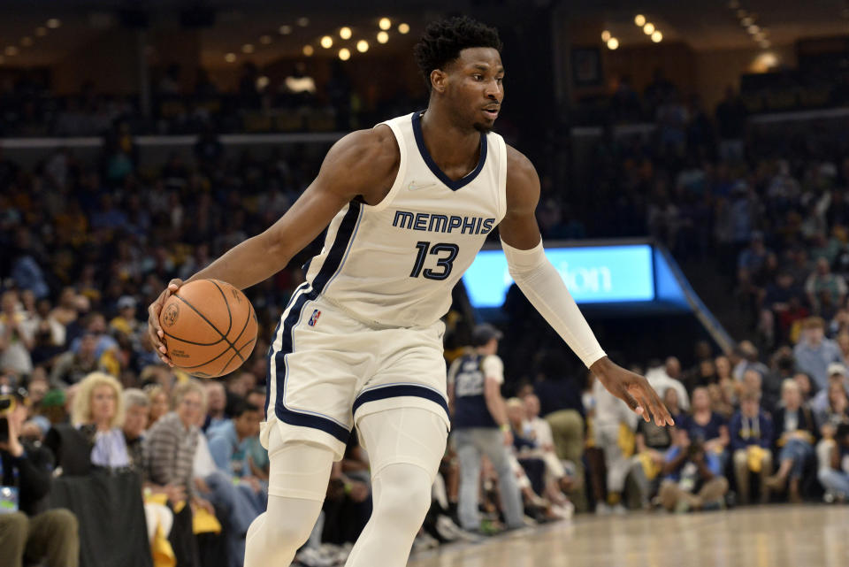 Memphis Grizzlies forward Jaren Jackson Jr. (13) handles the ball during Game 1 of a second-round NBA basketball playoff series against the Golden State Warriors Sunday, May 1, 2022, in Memphis, Tenn. (AP Photo/Brandon Dill)