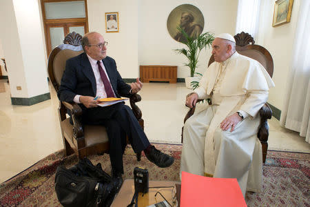 FILE PHOTO - Pope Francis listens to reporter question during an exclusive interview with Reuters at the Vatican June 17, 2018. Vatican Media/Handout via REUTERS