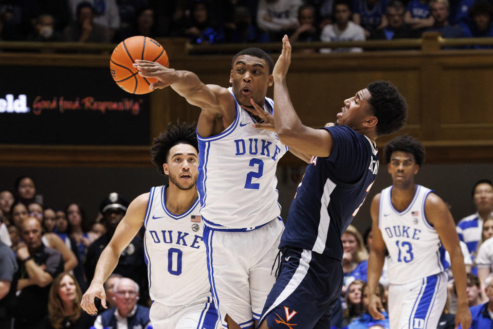 Duke's Jaylen Blakes (2) steals a pass intended for Virginia's Reece Beekman (2) during the second half of an NCAA college basketball game in Durham, N.C., Saturday, Mar. 2, 2024. (AP Photo/Ben McKeown)