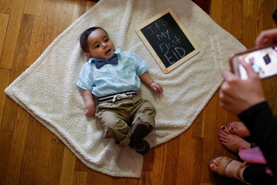 Six month old Palestinian American Waleed Shehadeh rests on a blanket as he is photographed by family members in celebration of the Muslim holiday Eid al-Fitr in Staten Island, New York, U.S., on June 25, 2017.&nbsp;