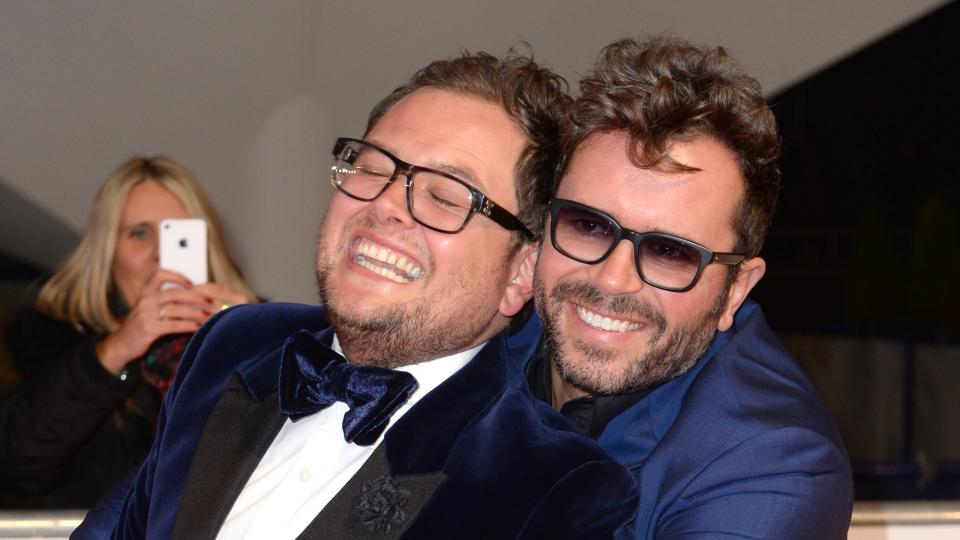 Alan Carr has split from his husband Paul Drayton after 13 years together. (PA)