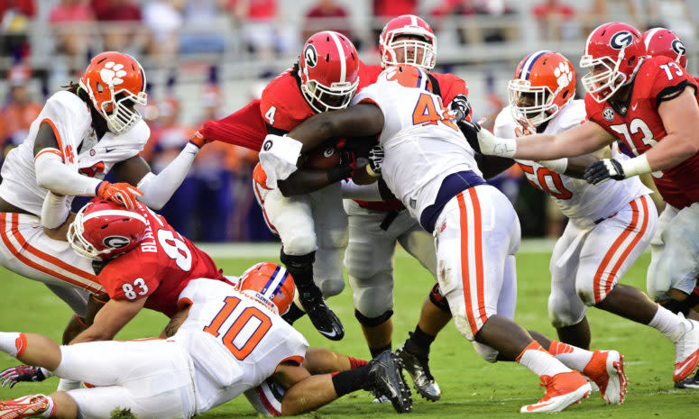 Clemson and Georgia face off in a college football game.