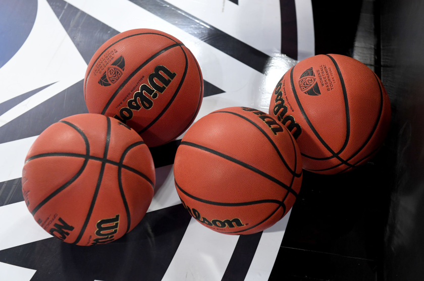 Basketballs on a court.