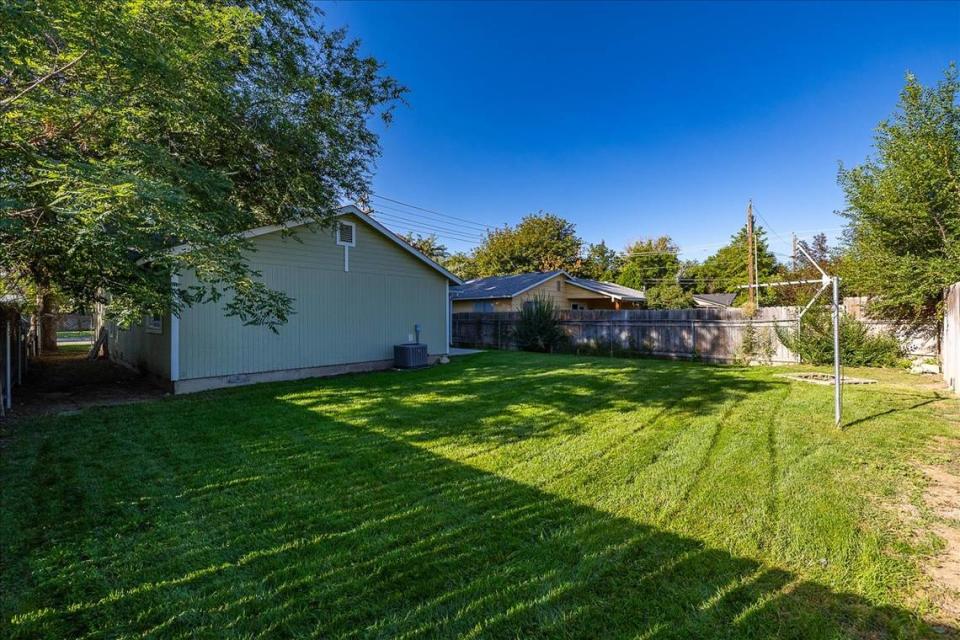 The house at 1250 W. Dundee St. includes a spacious back yard with a fire pit.