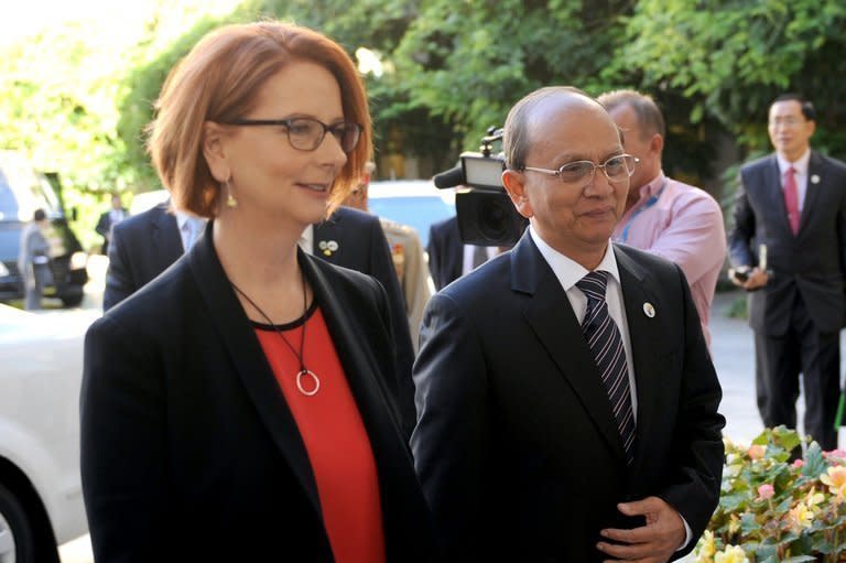 Australian Prime Minister Julia Gillard and Myanmar President Thein Sein at Parliament House in Canberra on March 18, 2013. Australia boosted aid and eased restrictions on defence cooperation with Myanmar as Thein Sein became the southeast Asian country's first head of state to visit since 1974