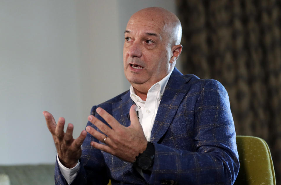 In this Sunday, June 23, 2019 photo, Ivan Simonovis responds to a question during a interview with The Associated Press, in Miami. In his first interview from exile in the U.S., Simonovis, the former police commissioner whose about 15-year detention became an opposition rallying cry, shares details of his movie-like breakout. (AP Photo/Lynne Sladky)