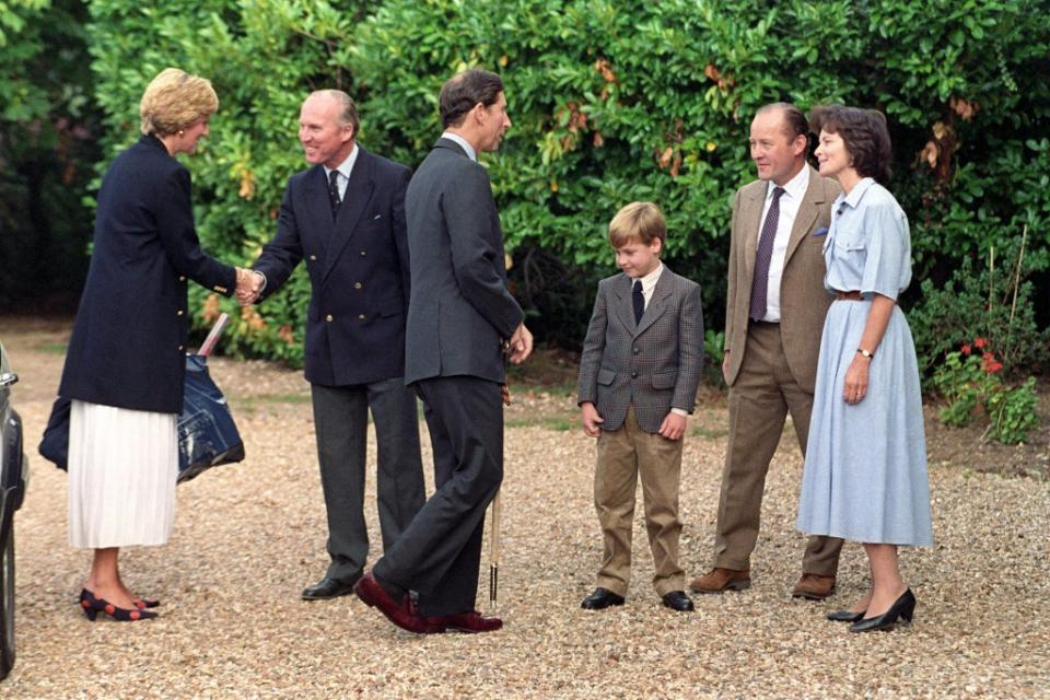 William with his parents is welcomed to Ludgrove School by then joint headmaster Nichol Marston (Martin Keene/PA) (PA Archive)