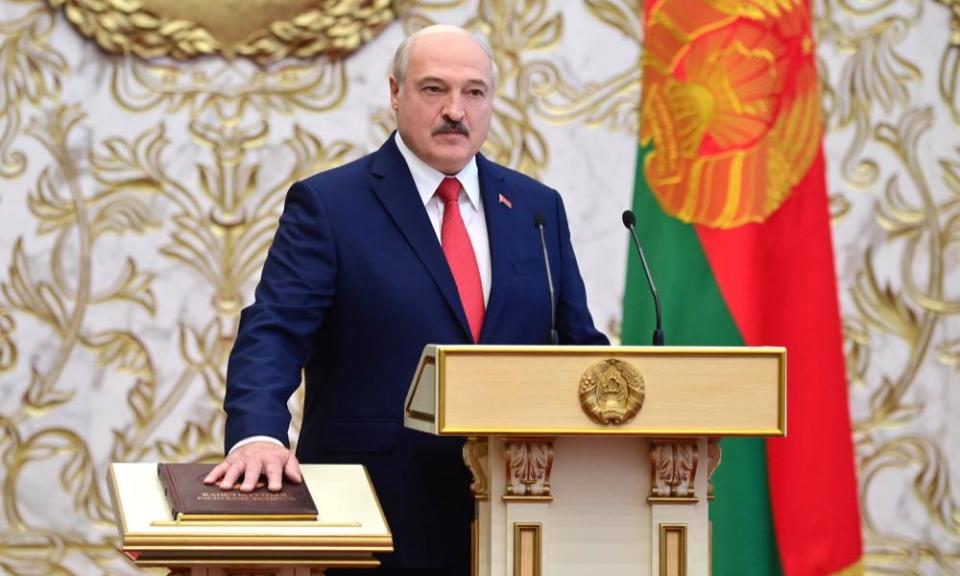 Alexander Lukashenko takes the oath of office during the inauguration ceremony.