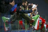 Rugby Union - Rugby Test - Italy v South Africa - Artemio Franchi stadium, Florence, Italy - 19/11/16. Italy's supporters celebrate at the end of the match against South Africa. REUTERS/Alessandro Bianchi