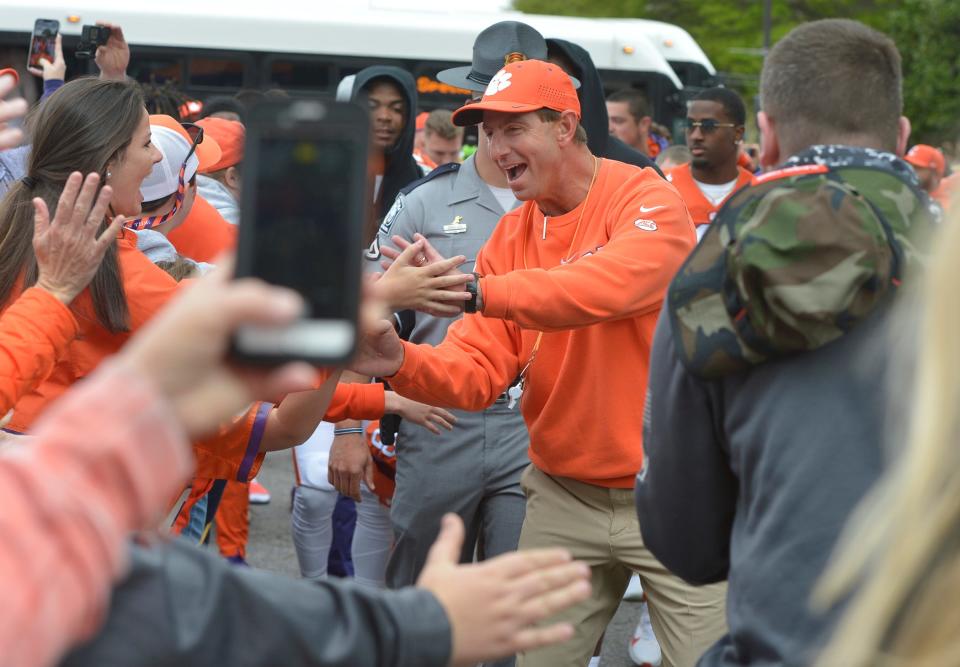 Clemson head coach Dabo Swinney enters the Tiger Walk before the 2022 spring game on April 9.