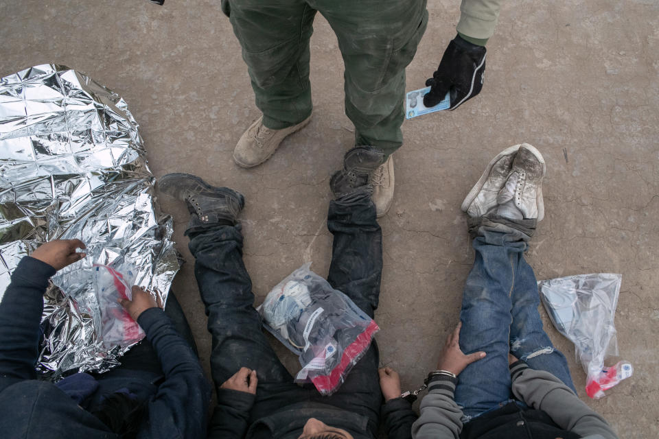 U.S. Border Patrol agents detain undocumented immigrants 