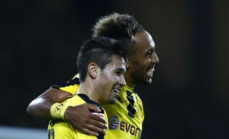 Football Soccer - Borussia Dortmund v SC Freiburg - German Bundesliga - Signal Iduna Park, Dortmund, Germany - 23/09/16 Borussia Dortmund goal scorers Raphael Guerreiro and Aubameyang (R) celebrate. RUTERS/Thilo Schmuelgen