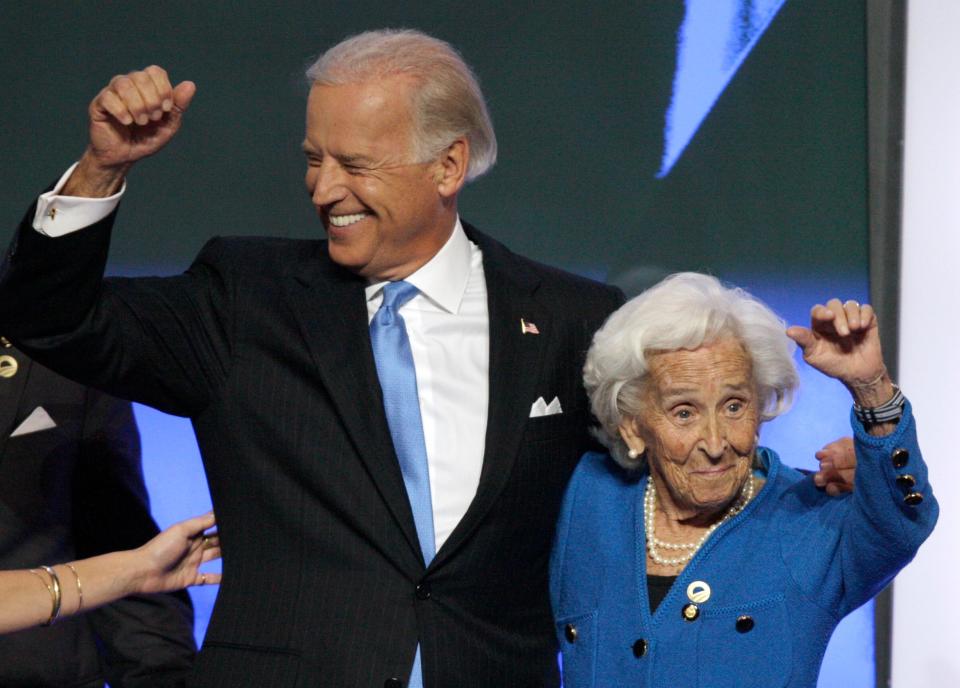 Democratic vice presidential nominee Sen. Joe Biden, D-Del., is joined by his mother, Jean, on stage after speaking at the Democratic National Convention in Denver on Wednesday, Aug. 27, 2008.