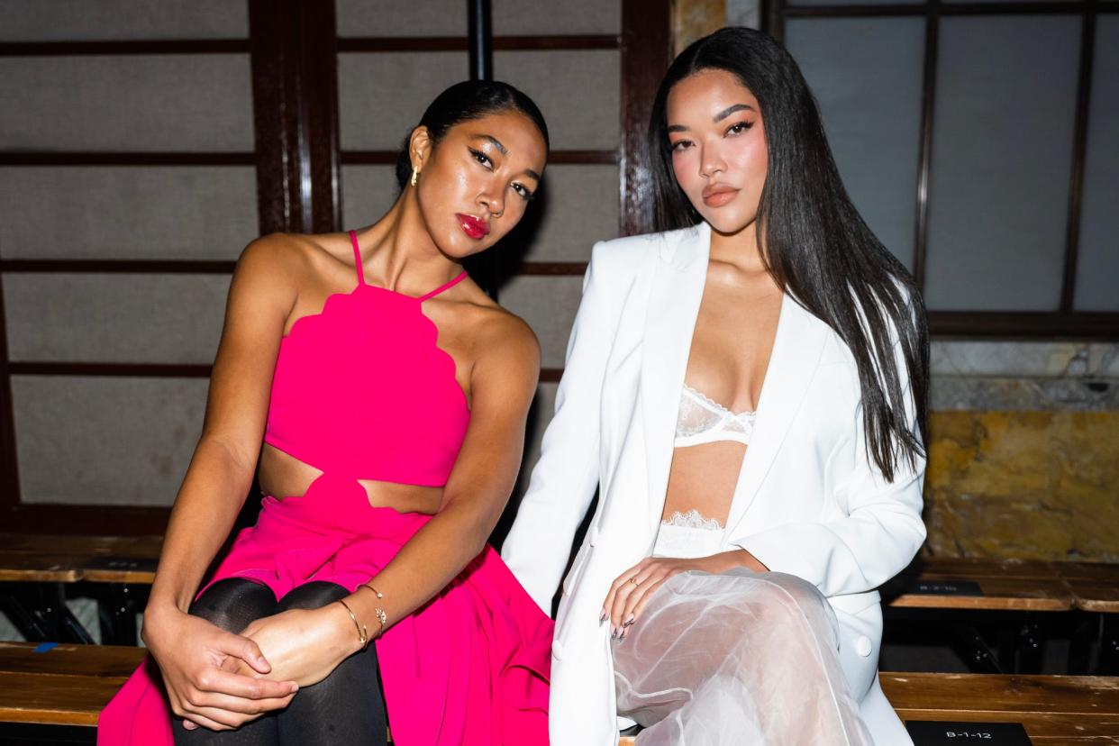Aoki Lee Simmons (L) and Ming Lee Simmons attend the Prabal Gurung fashion show during New York Fashion Week: The Shows at the New York Public Library on February 10, 2023 in New York City.