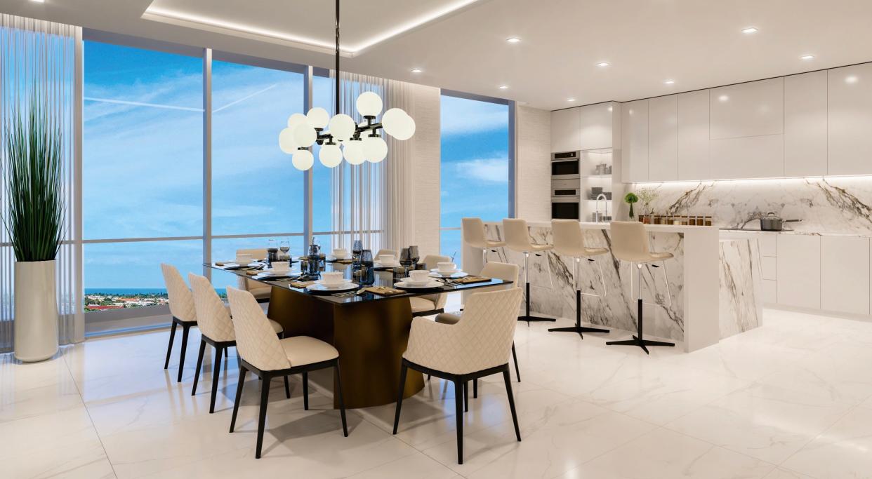 The open kitchens at Aura feature oversized islands and floor to ceiling glass windows, both popular features with buyers.