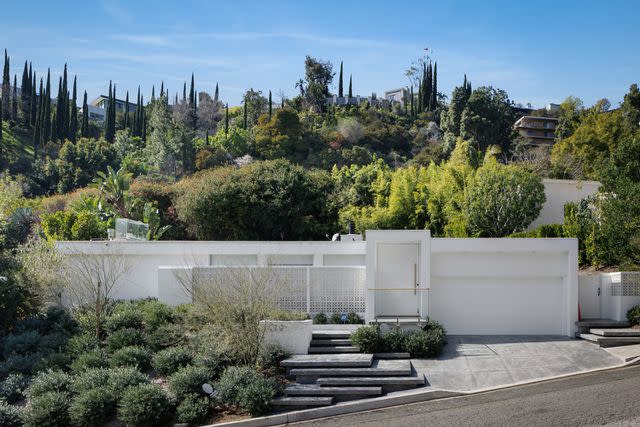 <p>Christopher Amitrano</p> Front exterior shot of Perry's Hollywood Hills home