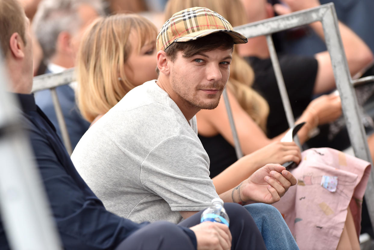 HOLLYWOOD, CA - AUGUST 22:  Louis Tomlinson attends the ceremony honoring Simon Cowell with star on the Hollywood Walk of Fame on August 22, 2018 in Hollywood, California.  (Photo by Axelle/Bauer-Griffin/FilmMagic)