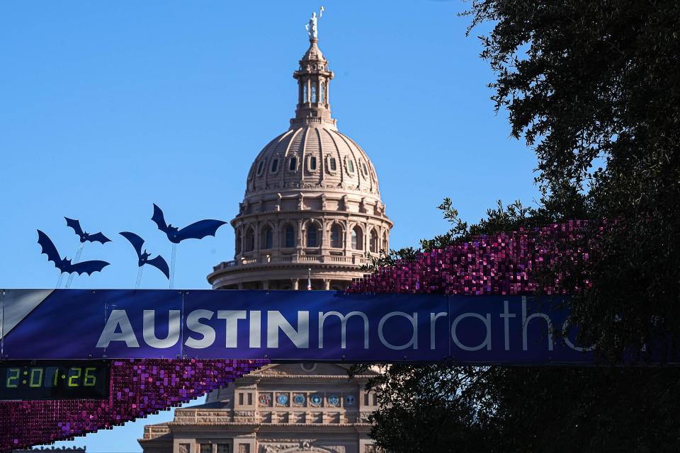 The 2024 Austin Marathon finish line is set up on Congress Ave. in front of the Texas Capitol for Sunday's annual race.