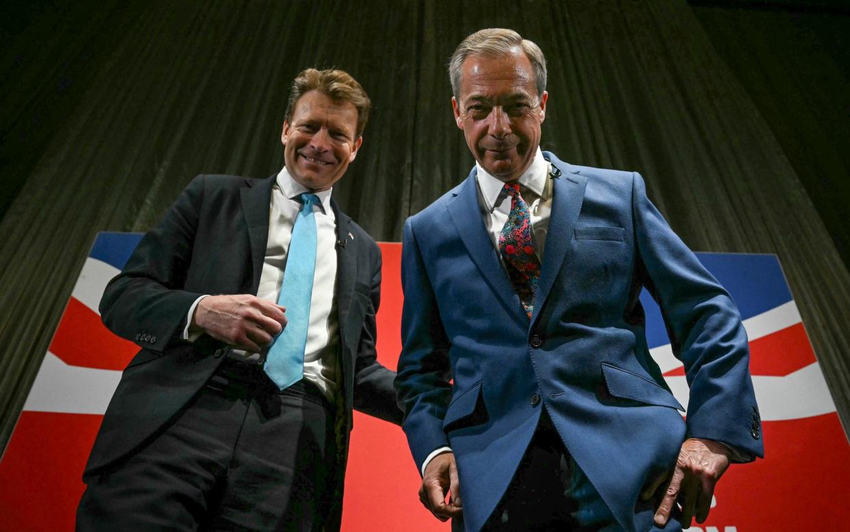 Richard Tice and Nigel Farage during a Reform UK campaign meeting