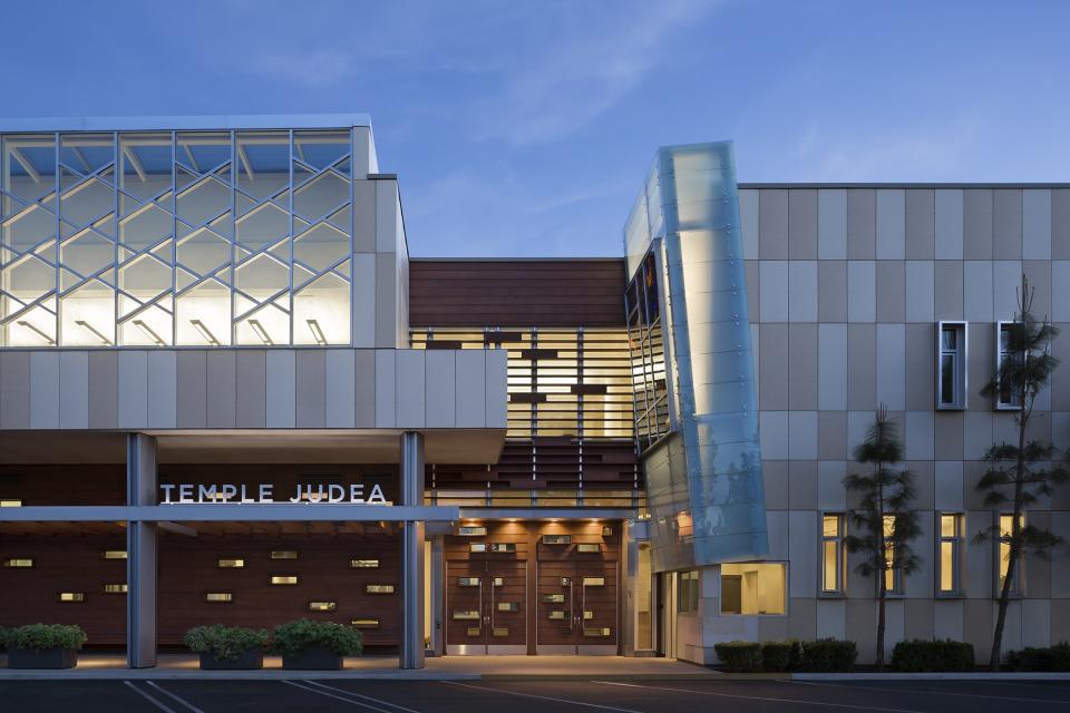 Temple Judea (Tarzana, California)
Earning the Herman Coliver Locus Architecture award from the AIA in 2012, the year it was completed, Temple Judea’s striking exterior includes mosaic steps and a laser-cut metal veil of Hebrew letters.