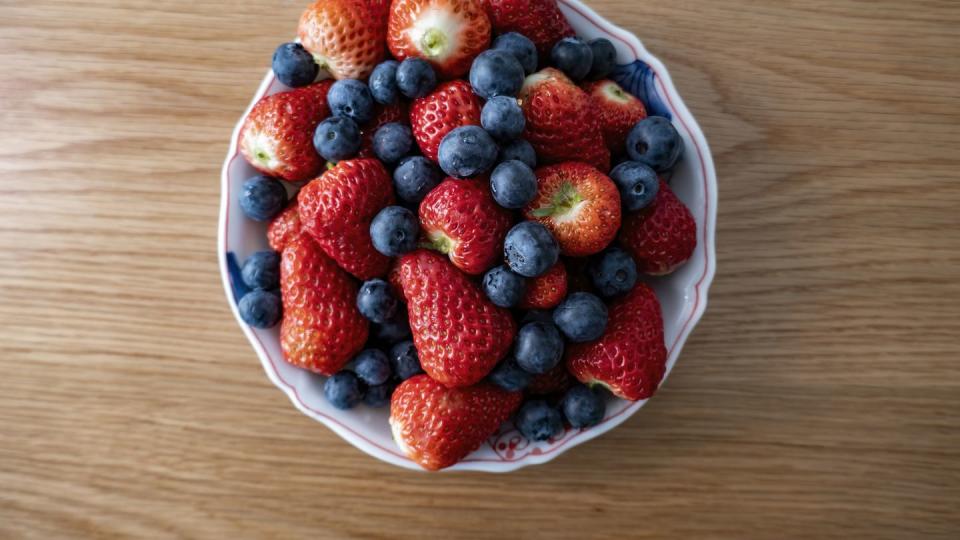 blueberries and strawberries on the plate