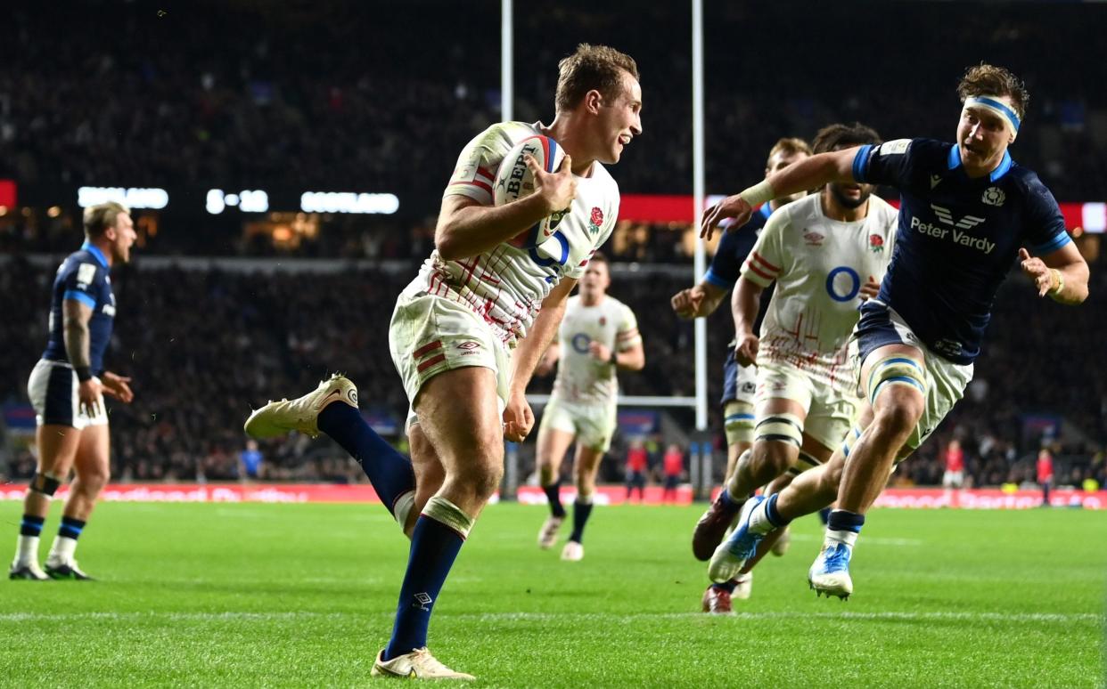  Max Malins of England runs with the ball before touching down for the second try during the Six Nations Rugby match between England and Scotland at Twickenham Stadium - Getty Images/Dan Mullan