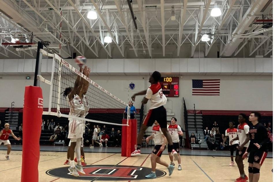 Durfee's Josh Sanon slams a kill shot during a recent game against New Bedford. The Hilltoppers swept all three matches against Attleboro on Thursday.