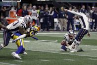 <p>New England Patriots’ Stephen Gostkowski, right, misses a field goal as Ryan Allen (6) holds during the first half of the NFL Super Bowl 53 football game against the Los Angeles Rams, Sunday, Feb. 3, 2019, in Atlanta. (AP Photo/David J. Phillip) </p>