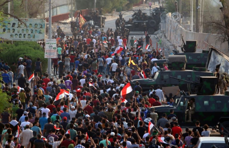 Iraqis protest outside the regional government headquarters in the southern city of Basra on September 5, 2018