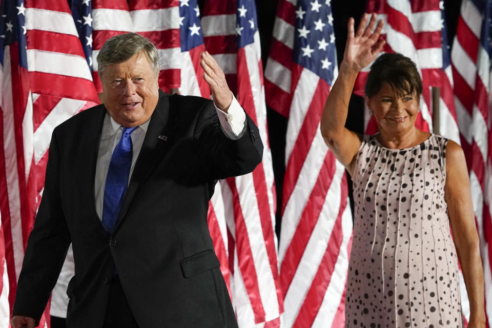 FILE - Viktor Knavs and Amalija Knavs, parents of first lady Melania Trump, wave after President Donald Trump spoke from the South Lawn of the White House, Aug. 27, 2020, in Washington. Amalija Knavs has died, according to an announcement by Melania Trump late Tuesday, Jan. 9, 2024. (AP Photo/Alex Brandon, File)