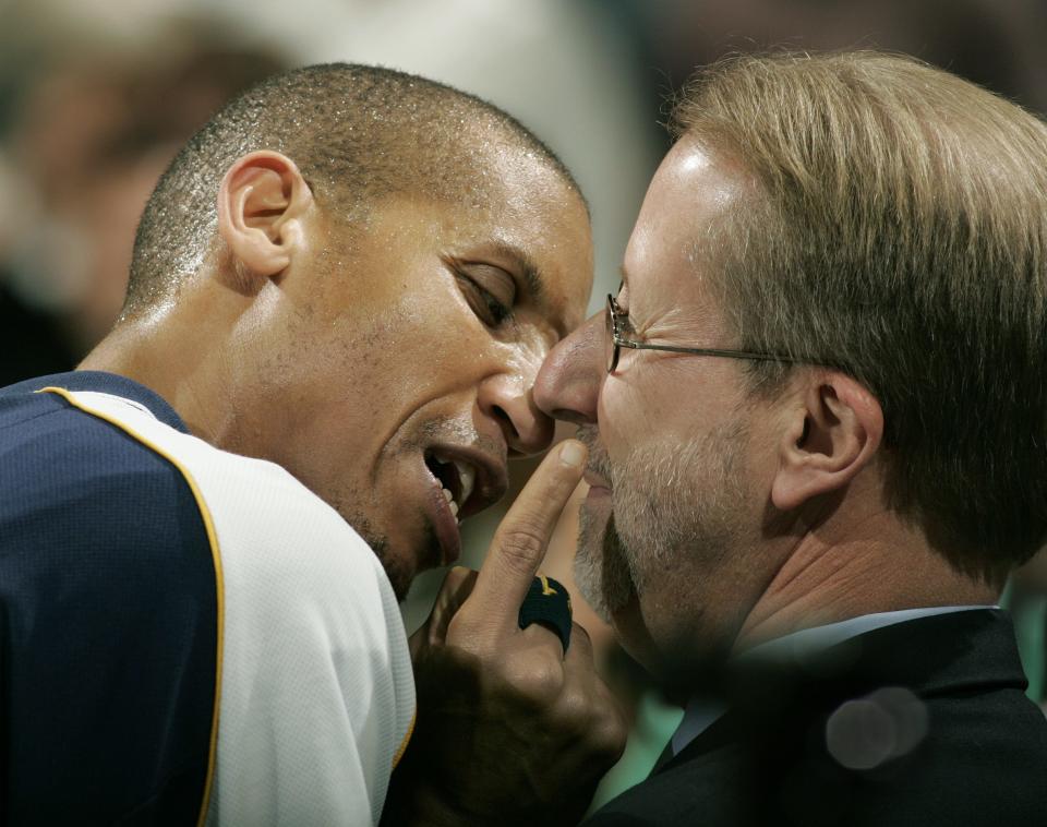FILE --  Reggie Miller and media relations David Benner take part in their pregame ritual, where Reggie screams at Benner nose-to-nose for about 3-4 minutes.