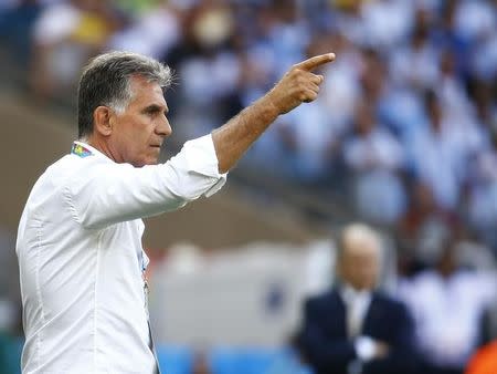 Iran's coach Carlos Queiroz gestures during their 2014 World Cup Group F match against Argentina at the Mineirao stadium in Belo Horizonte June 21, 2014. REUTERS/Kai Pfaffenbach