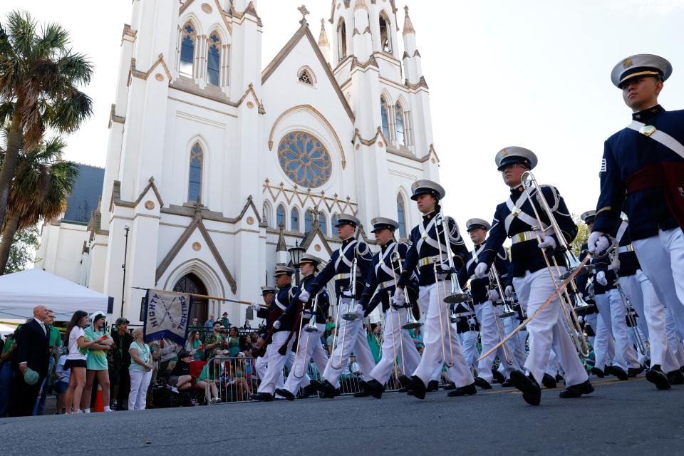 The Highty Tighties march past the Cathedral Basilica of St. John the Baptist during the Savannah St. Patrick's Day Parade on Saturday, March 16, 2024.