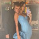 <p>Dressed up for another date night, Justin uploaded a photo with his neck nestled onto wife Hailey Baldwin Bieber's shoulder. In the picture, Hailey had her hair styled in an up do and wore a baby blue latex Versace mini dress while Justin wore an all-black Saint Laurent suit.</p><p><a href="https://www.instagram.com/p/CSZqnBuFmbi/" rel="nofollow noopener" target="_blank" data-ylk="slk:See the original post on Instagram;elm:context_link;itc:0;sec:content-canvas" class="link ">See the original post on Instagram</a></p>