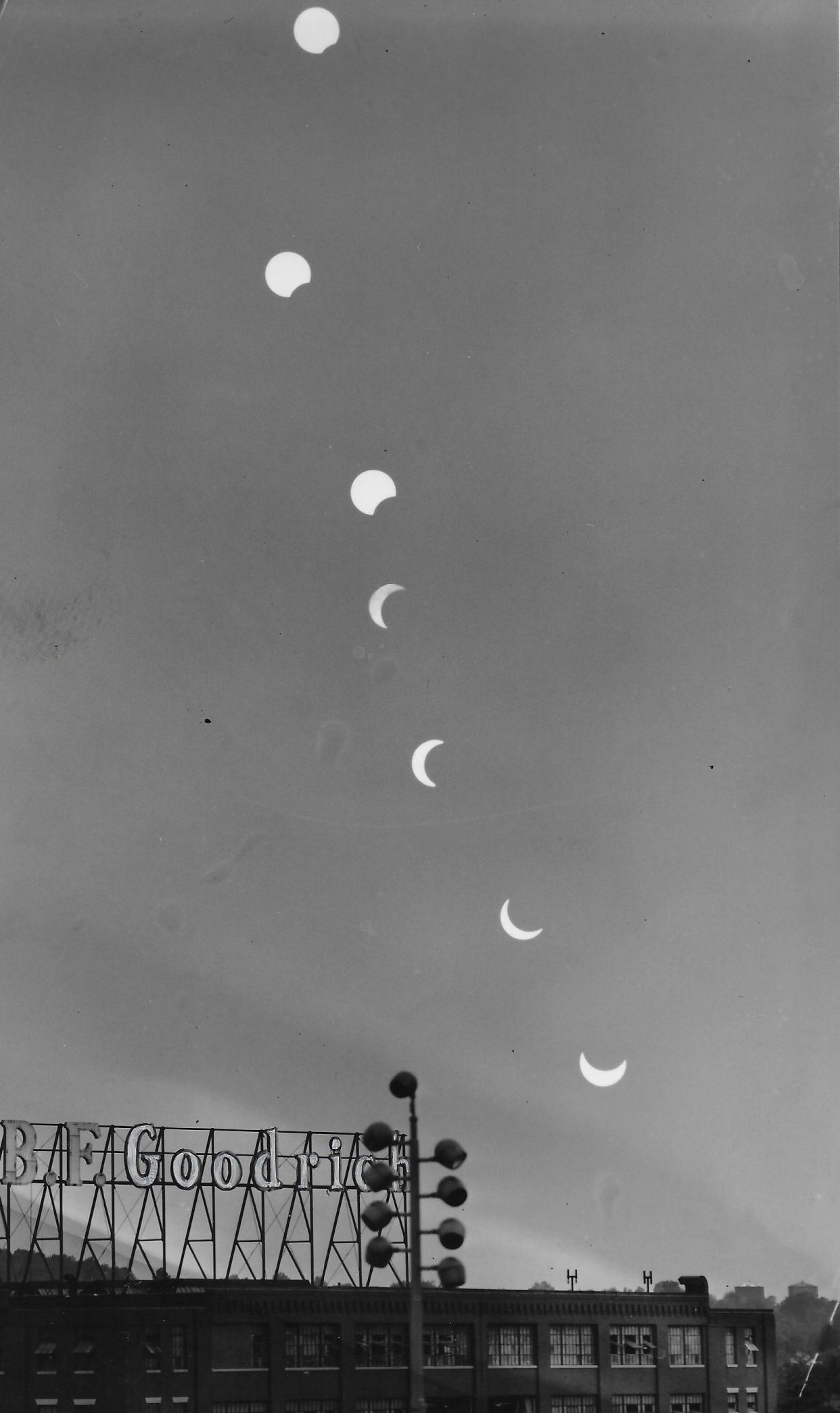 Beacon Journal photographer Ted Walls captures a sequence of shots on the same film as the moon obscures the sun July 20, 1963, over B.F. Goodrich headquarters in downtown Akron. Heavy clouds interrupted the sequence.