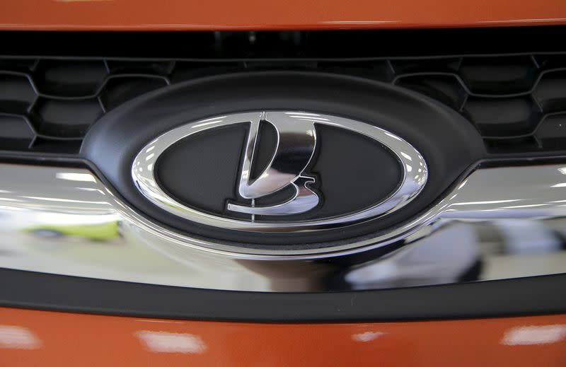 Logo of Russian automobile maker Avtovaz is seen on a Lada car at a dealership in Moscow