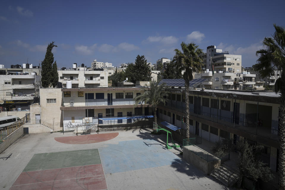 A closed school is seen in the West Bank city of Bethlehem, Tuesday, March. 28, 2023. Palestinian public schools across the occupied West Bank have been shuttered since Feb. 5, in one of the longest teachers' strikes in recent memory against the cash-strapped Palestinian Authority. (AP Photo/Mahmoud Illean)