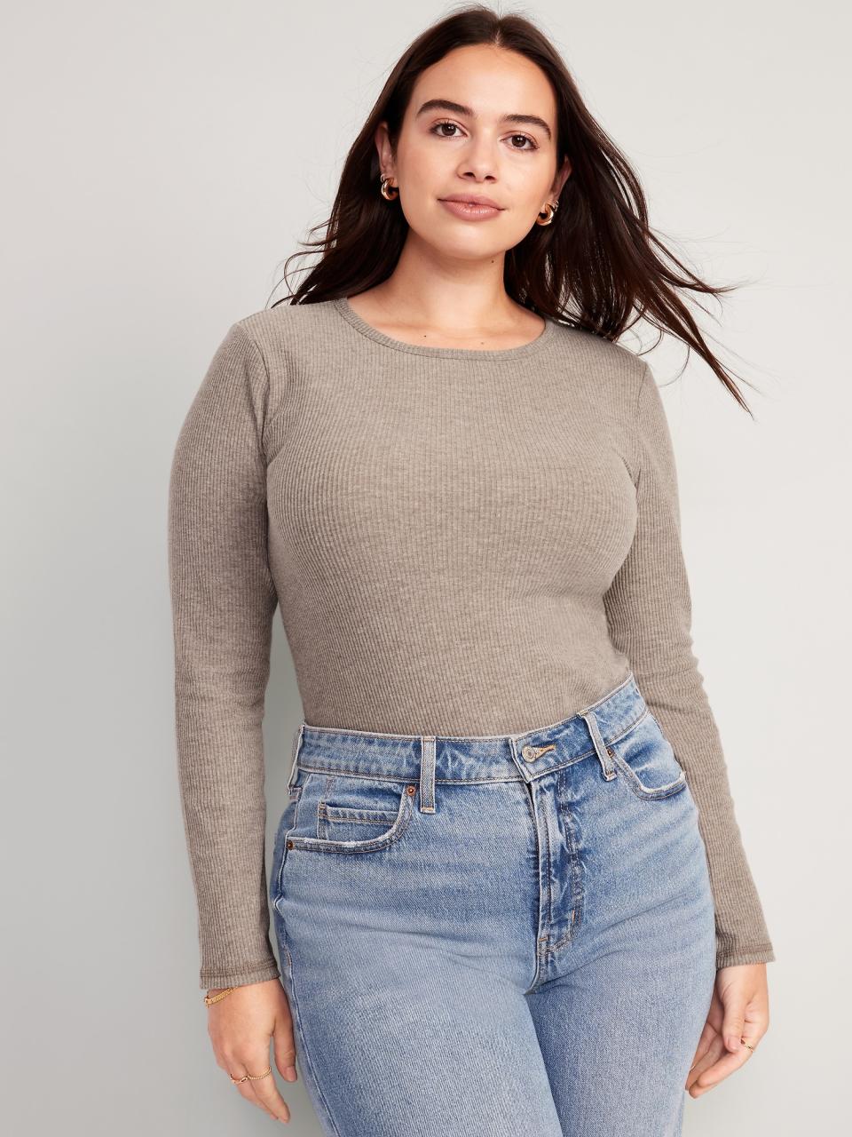 someone wearing the Plush Long-Sleeve Crew-Neck T-Shirt with jeans
