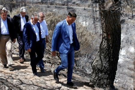 Spain's acting Prime Minister Pedro Sanchez visits Gran Canaria in Canary Islands that has been affected by Spain's worst wildfire in six years, in Valleseco